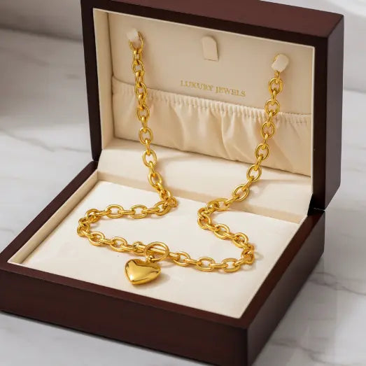 Gold heart necklace in jewelry box