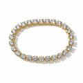 Gold tennis bracelet - white background