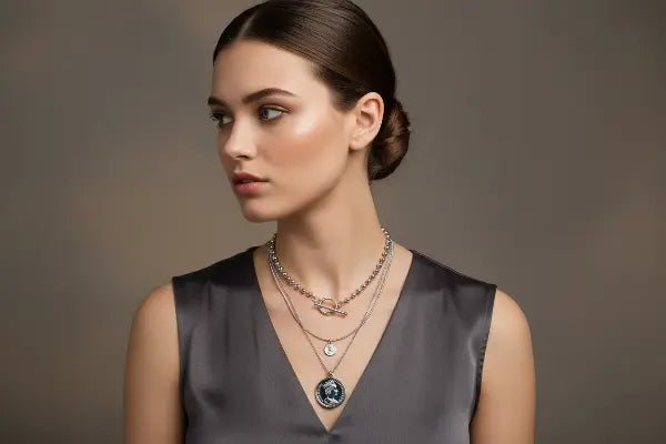 Model Wearing Layered Silver Necklace