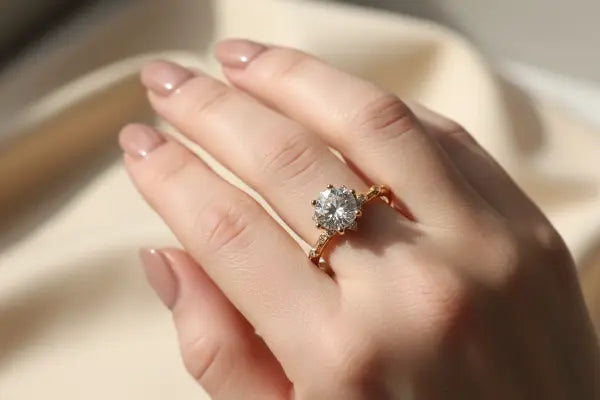 Model wearing solitaire ring