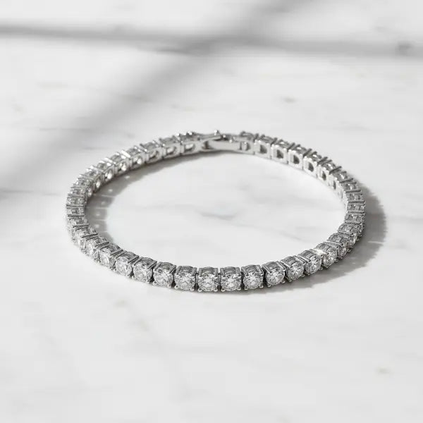 Silver tennis bracelet on marble
