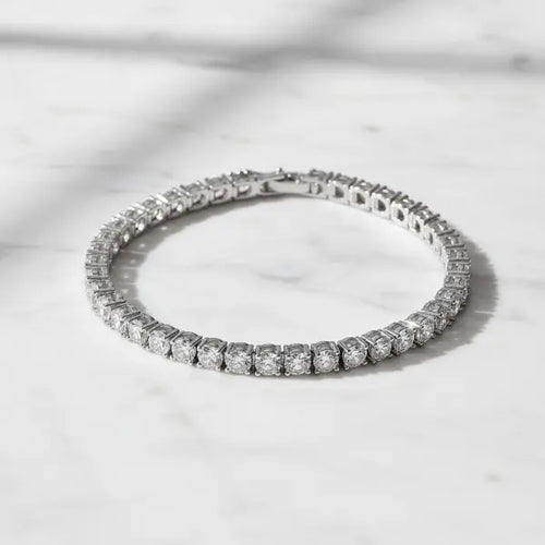 Silver tennis bracelet on marble